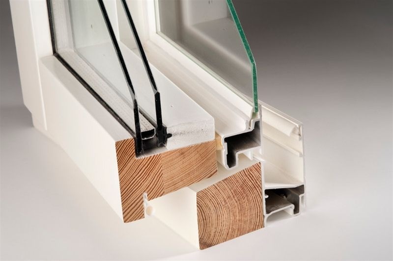 Cross section of wood aluminum triple pane hybrid window frame