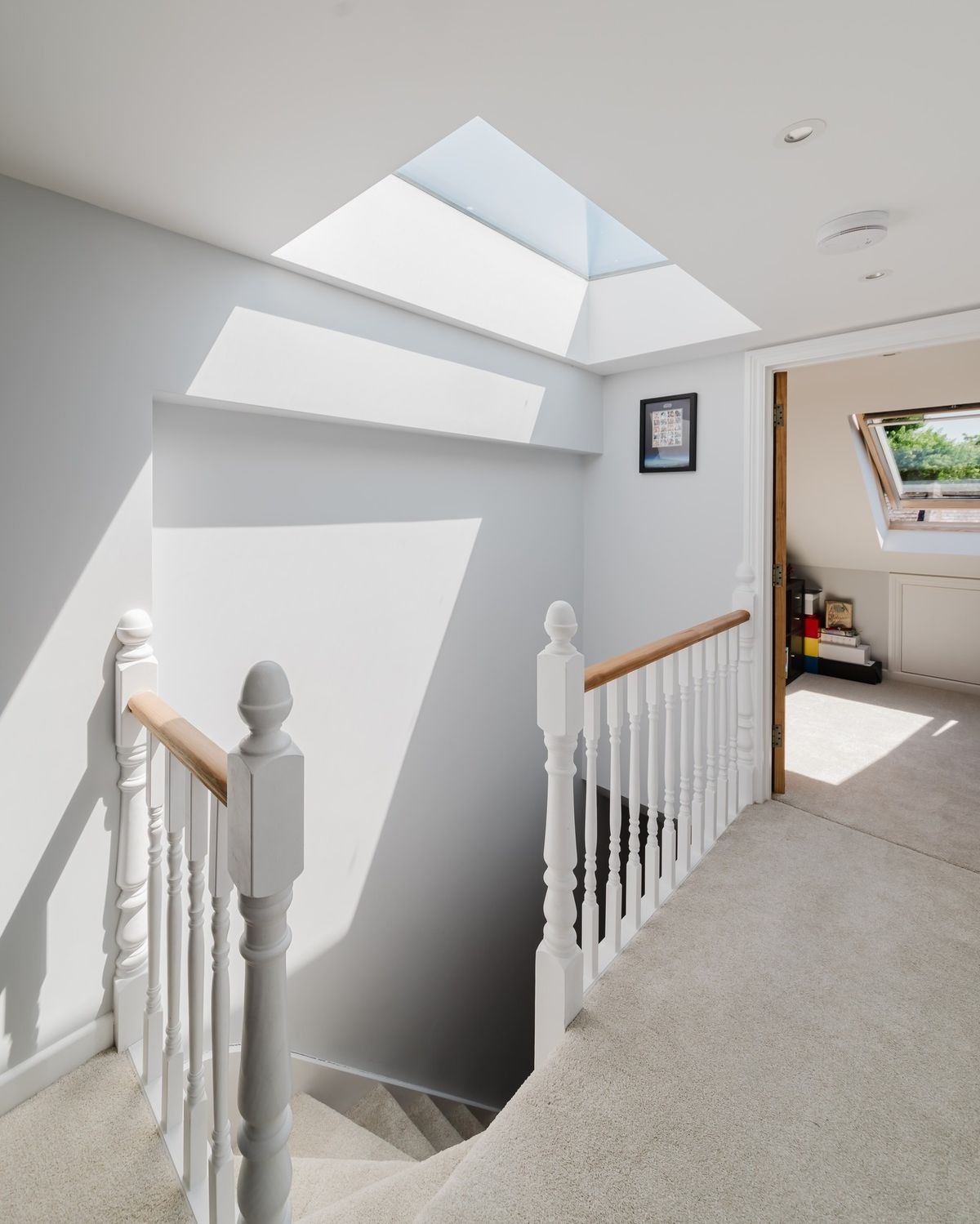 Bright stairwell with skylight and natural light in home